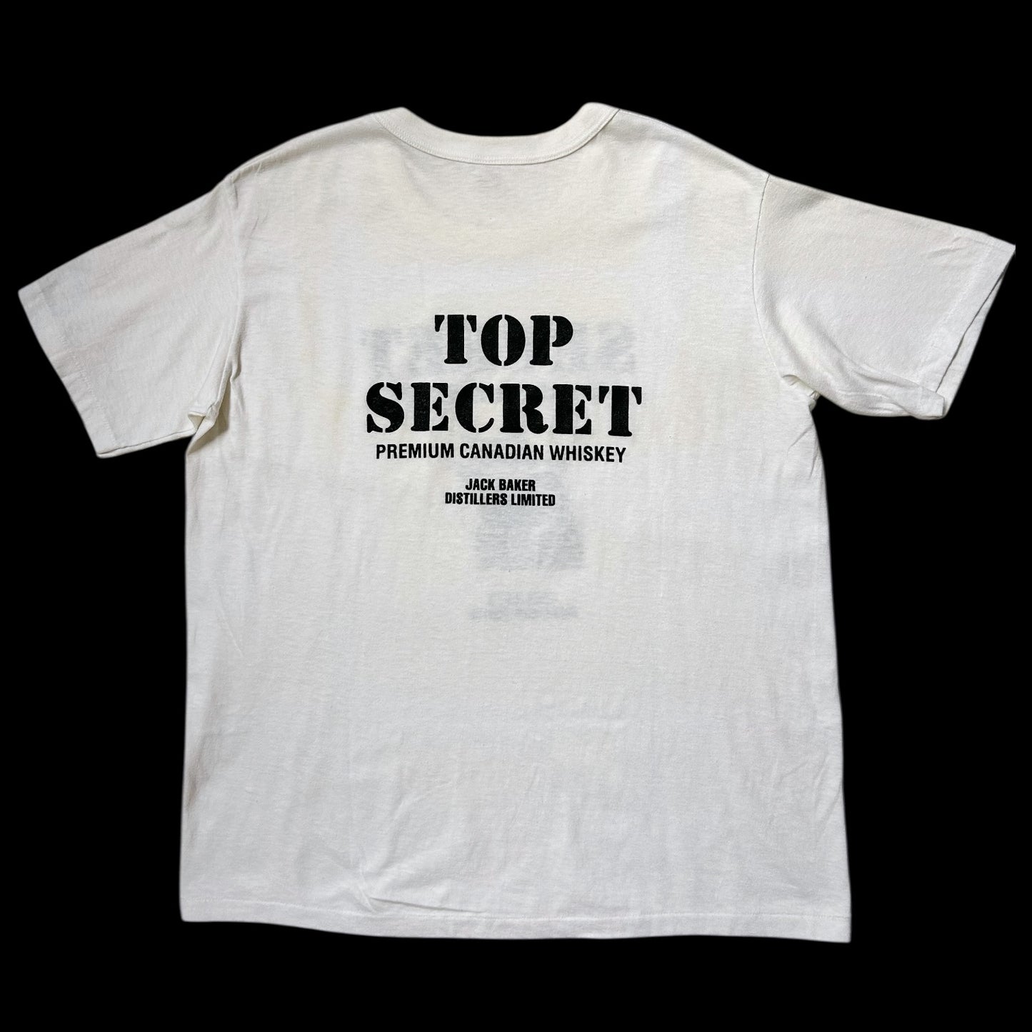 80s Vintage Jack Baker Secret Canadian Whiskey T-shirt.