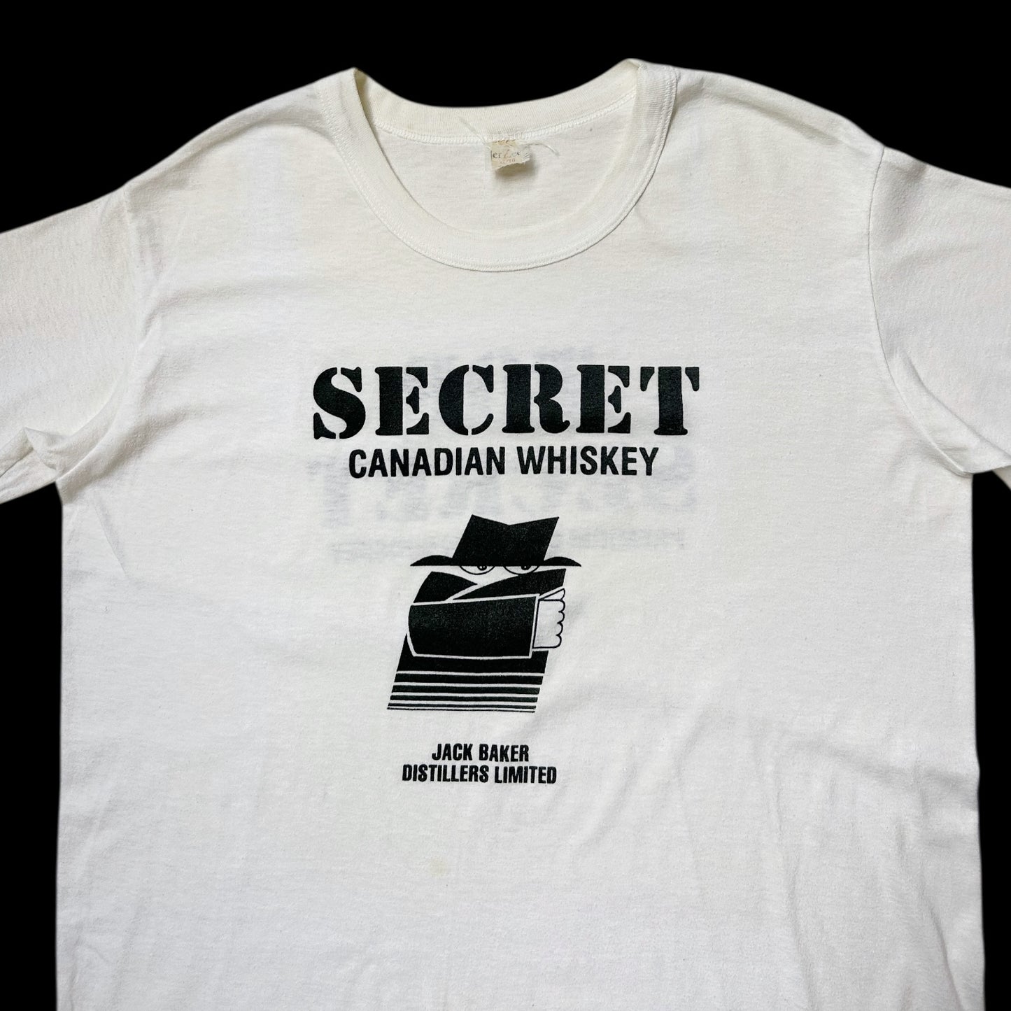 80s Vintage Jack Baker Secret Canadian Whiskey T-shirt.