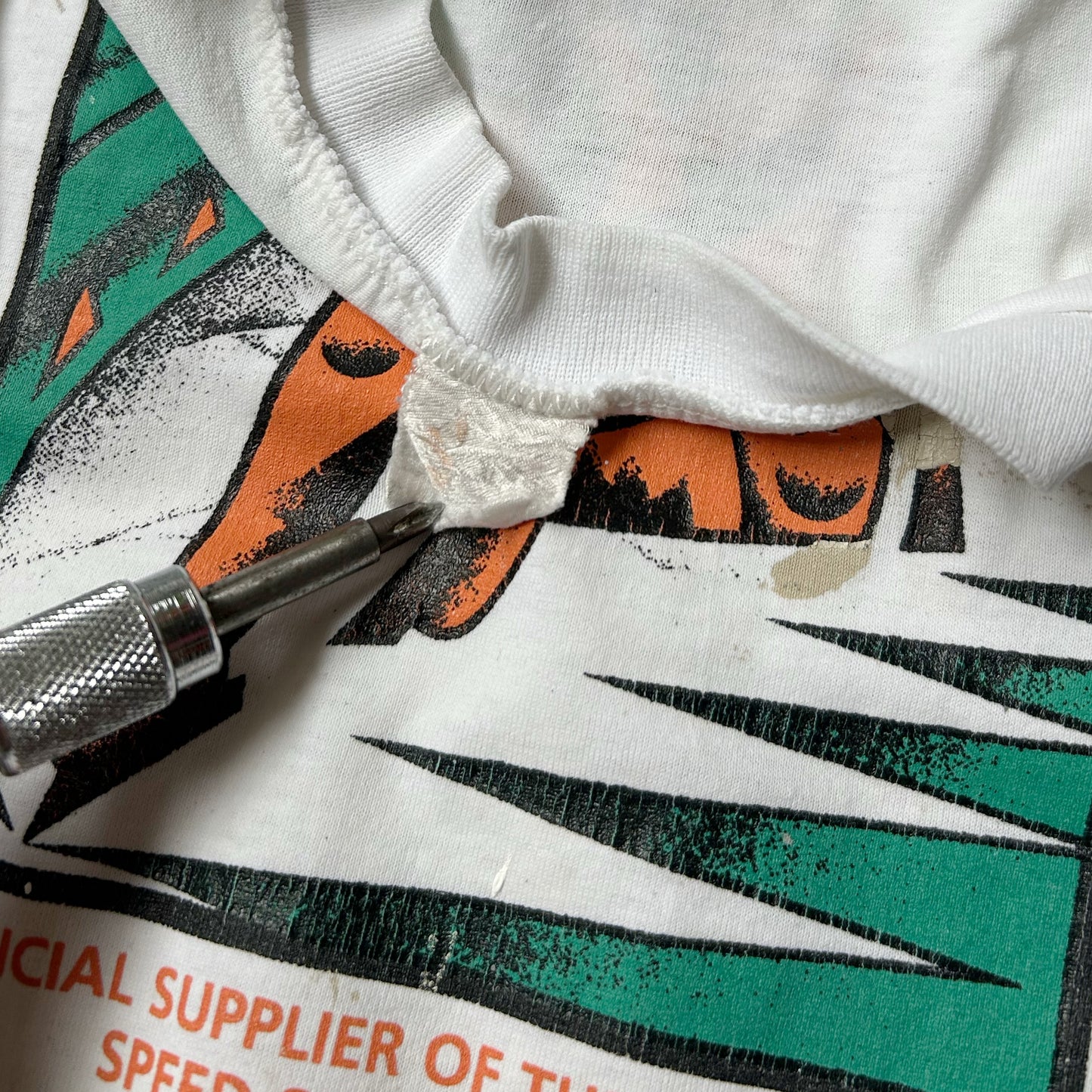 90s Vintage Distressed Vitathion Canadian Speedskating T-shirt.